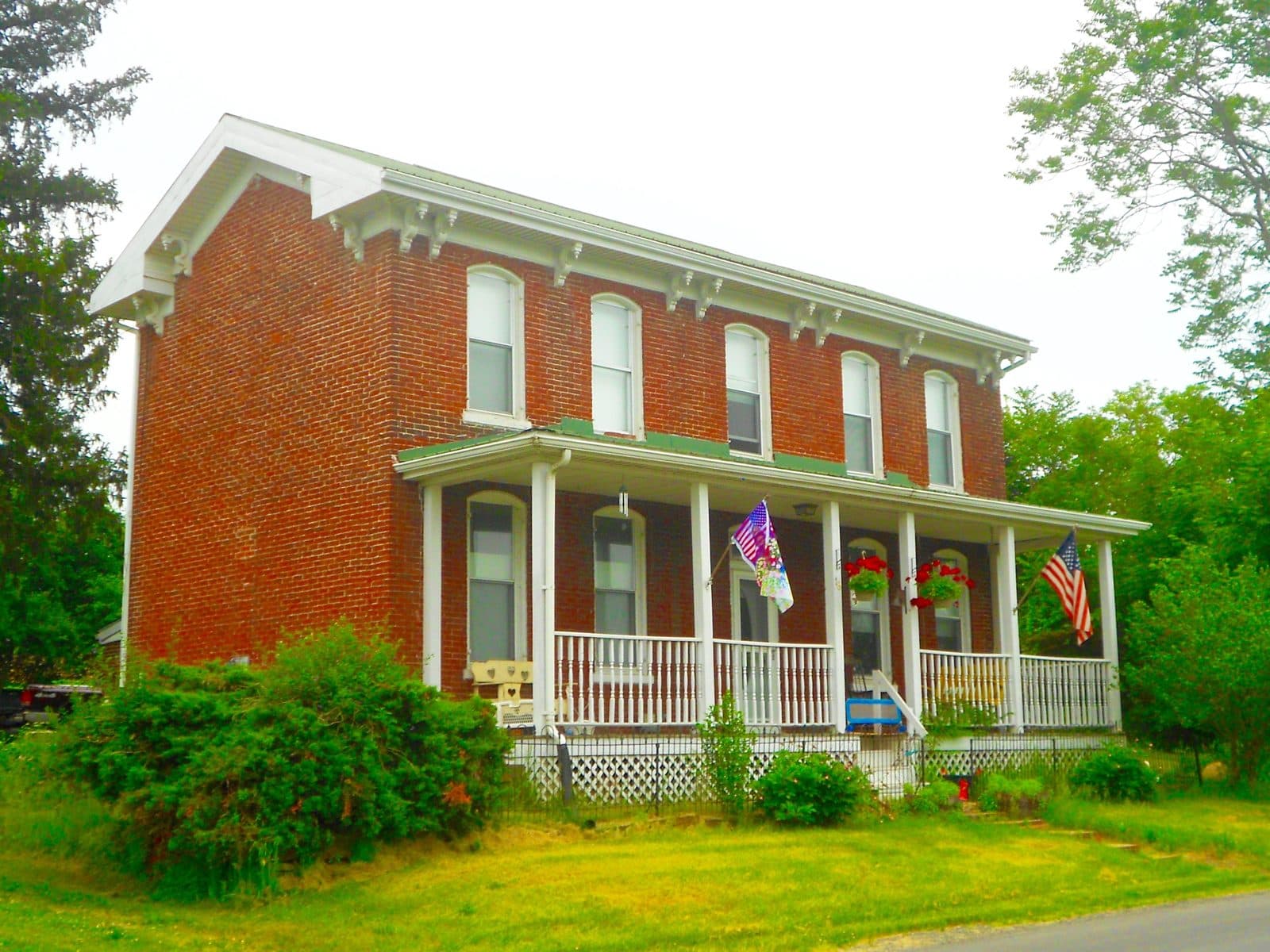 Historic brick two story, 4 bed 2 bath, big porch