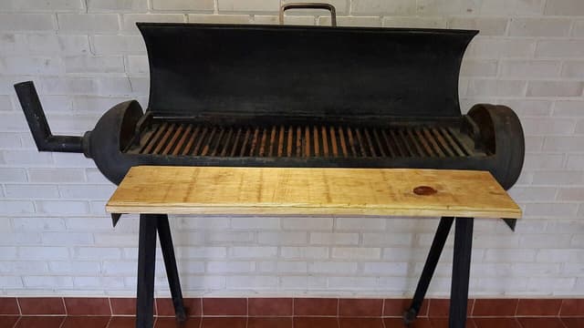 Homemade charcoal tank grill with wood front shelf