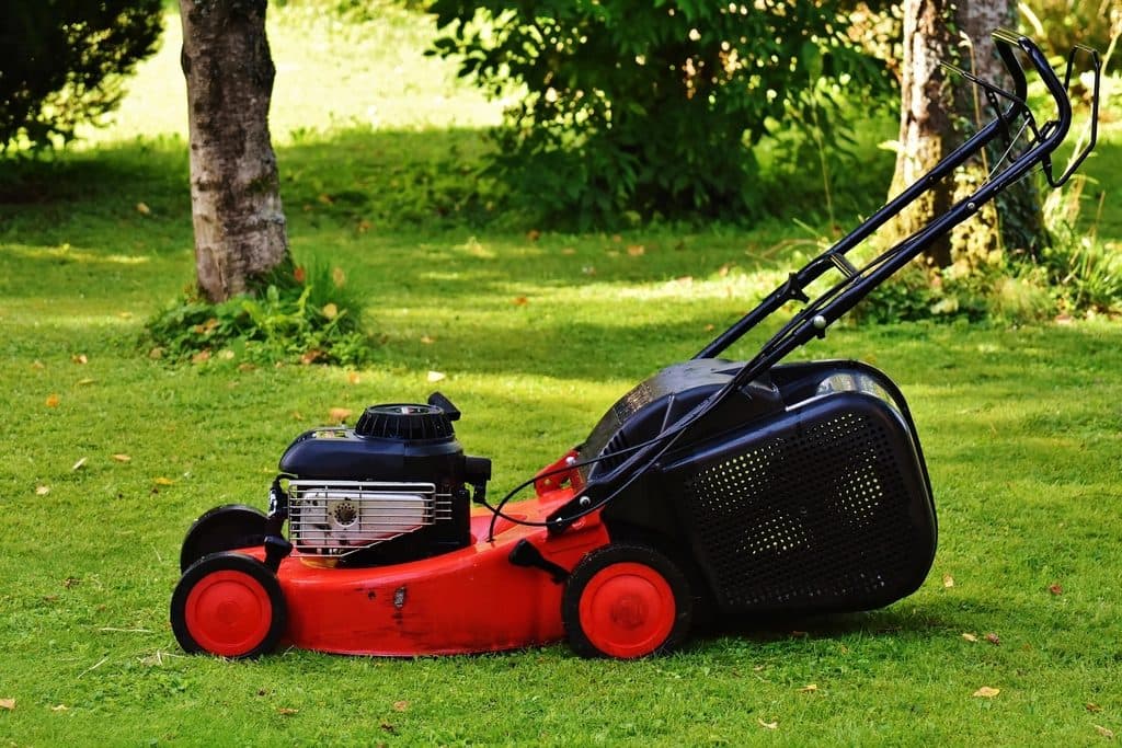 Red gas push mower with rear grass catcher