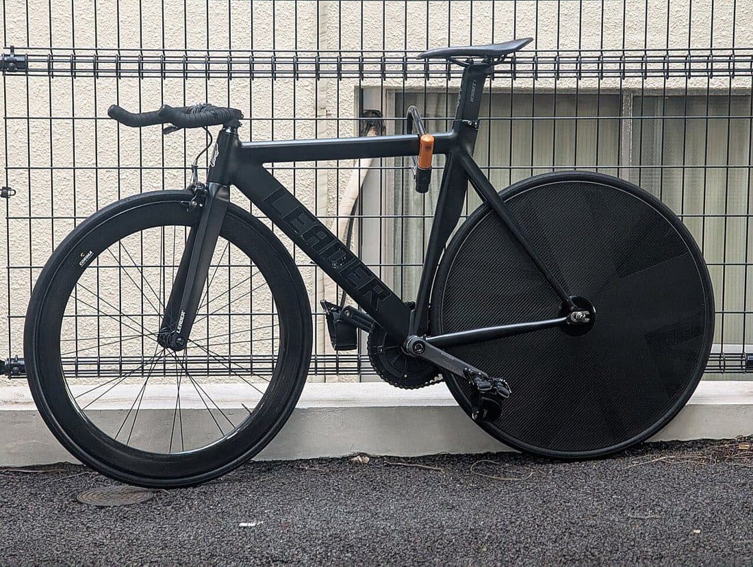 Leader track bike with carbon disc rear wheel